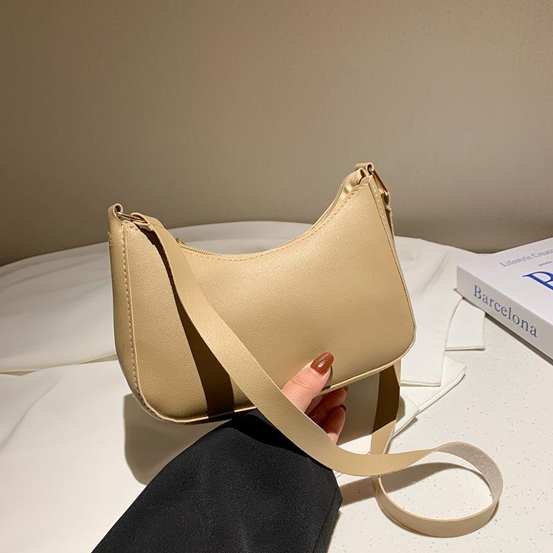 Eine modische DAMEN Tasche Unterarmtasche