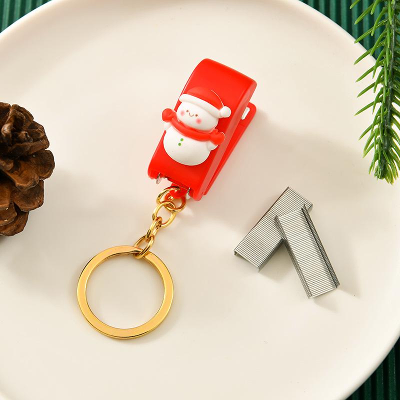 Vánoční kreslená mini sešívačka s klíčenkou - Roztomilý studentský dárek