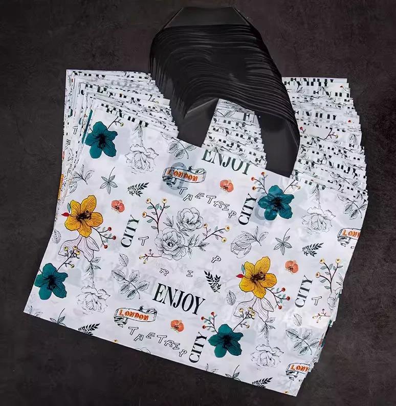 50pcs New models Handbag thick 0.14mm durable clothing cosmetic gift Shopping bags Resilient Powerful handheld Portable Packaging bag