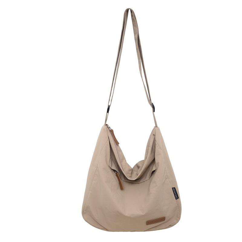 Women's bag Large capacity canvas bag Premium portable messenger simple tote bag Fashion versatile shoulder messenger bag