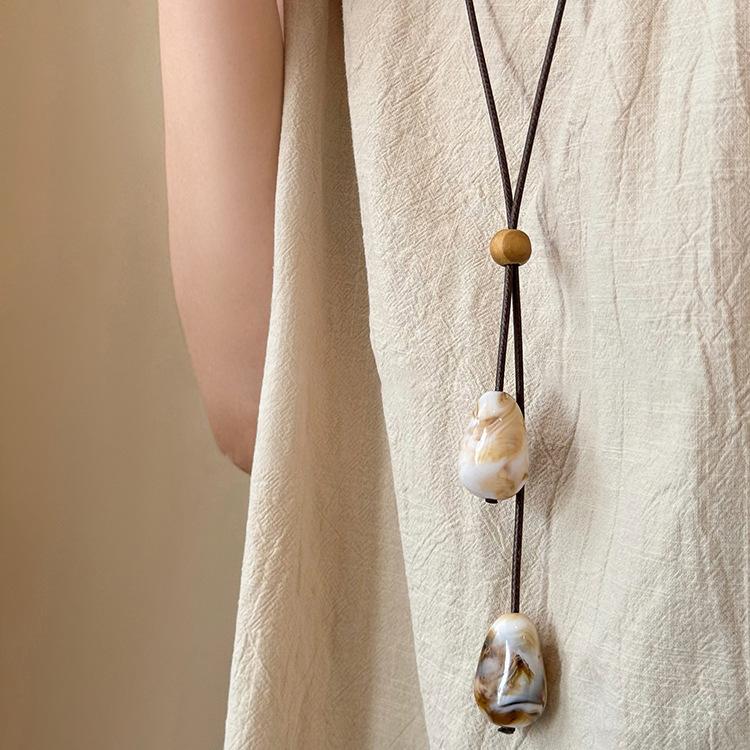 Korean ins style geometric hollow fringed pearl necklace accessories women's fashion sweater chain accessories