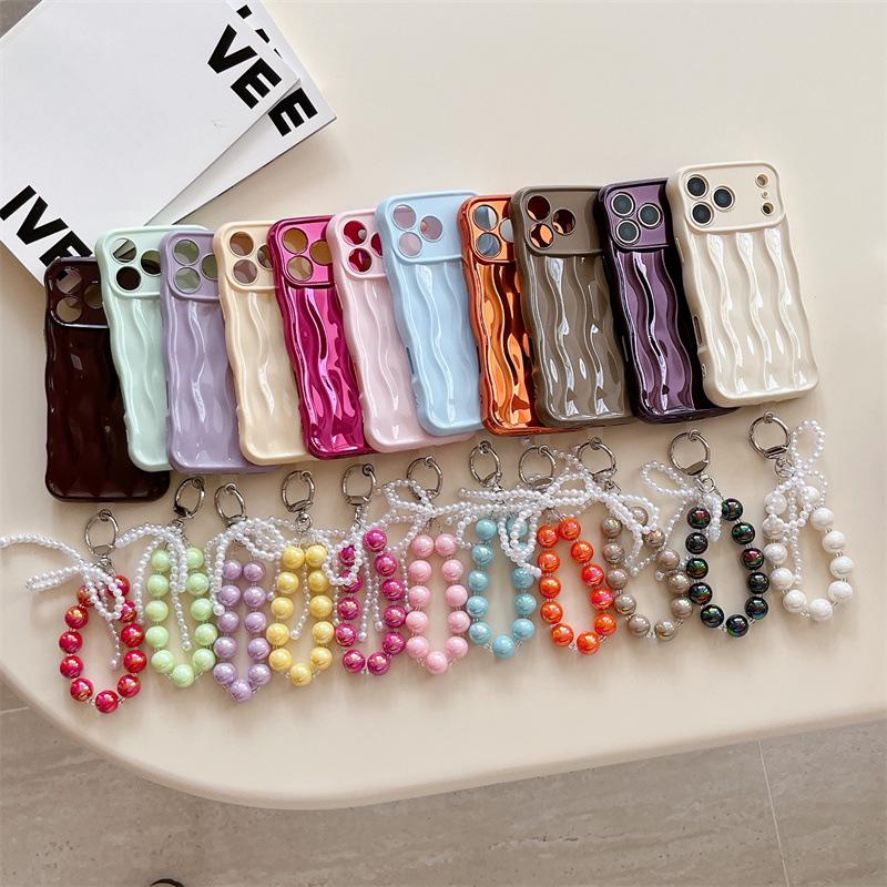 3D Wave Pattern Soft Shell Phone Case with Bracelet for iPhone 17 Pro Max/Apple 16 Solid Color
