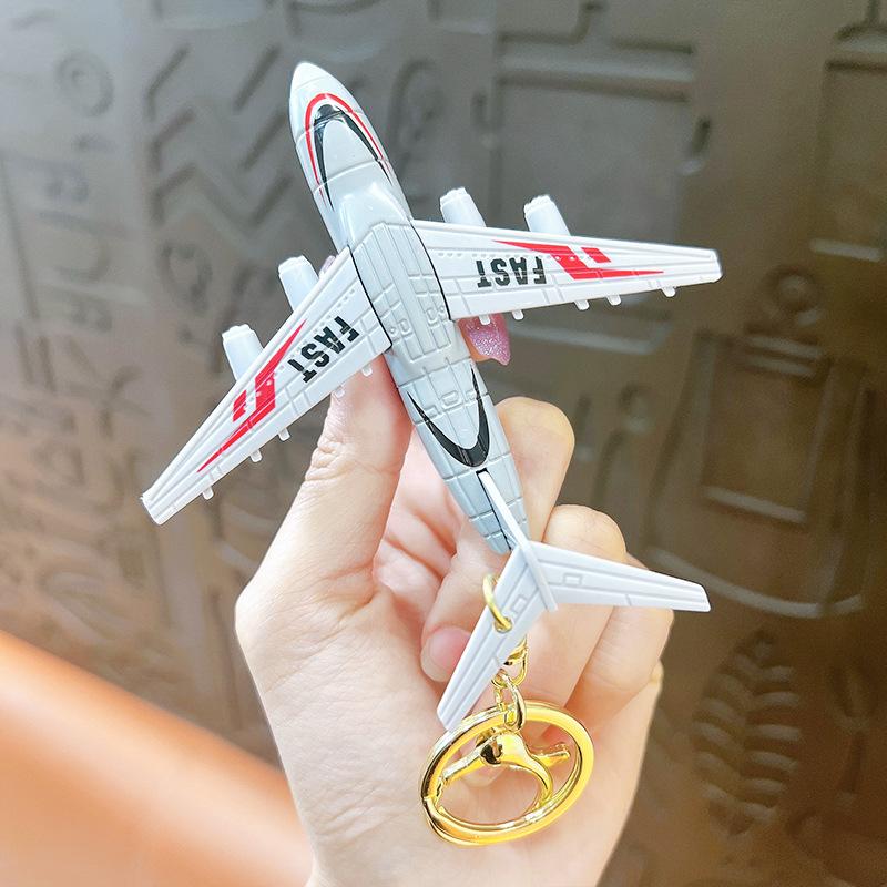 

Creative Cartoon Simulation Fighter Aircraft Toy Model Keychain Pendant Inertia Aircraft Desktop Ornament Pull Back Car Boy Gift