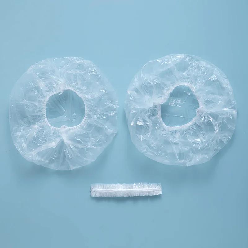 100 teile/satz Einweg-Duschhauben Kunststoff Wasserdichte Kopfbedeckung Rosa Spa Salon Hotel Haarfärbemittel Frauen Elastische haar Kappe Bad