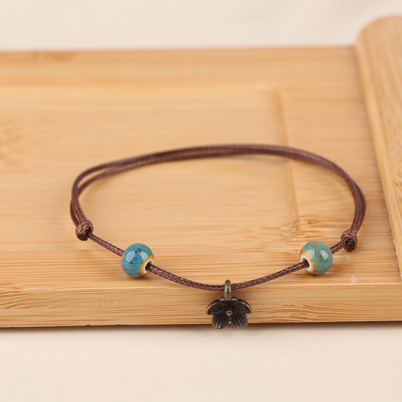 

Simple Ceramic Braided Bracelet For Women Cute Flower Beaded Wrist Rope Party Charm Jewelry Gift синій