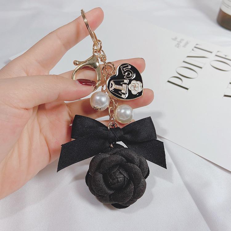 Kreativer DIY Perlenketten Camellia Schlüsselanhänger doppelseitig Modischer Auto Schlüsselanhänger Anhänger für Frauen