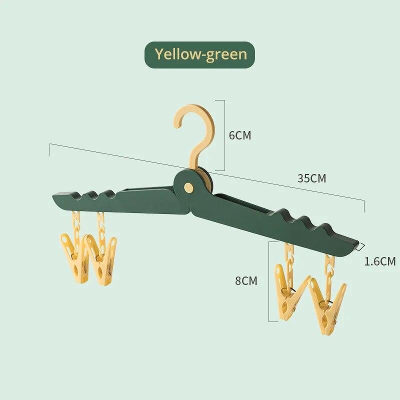 1 шт Красочные дорожные вешалки портативные складные вешалки для одежды дорожные аксессуары складная сушилка для детской одежды зелёный 666₽