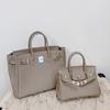 Togo primo strato pelle di mucca borsa platino motivo litchi fibbia argentata borsa a mano serratura di alta gamma borsa a tracolla messenger in pelle da donna
