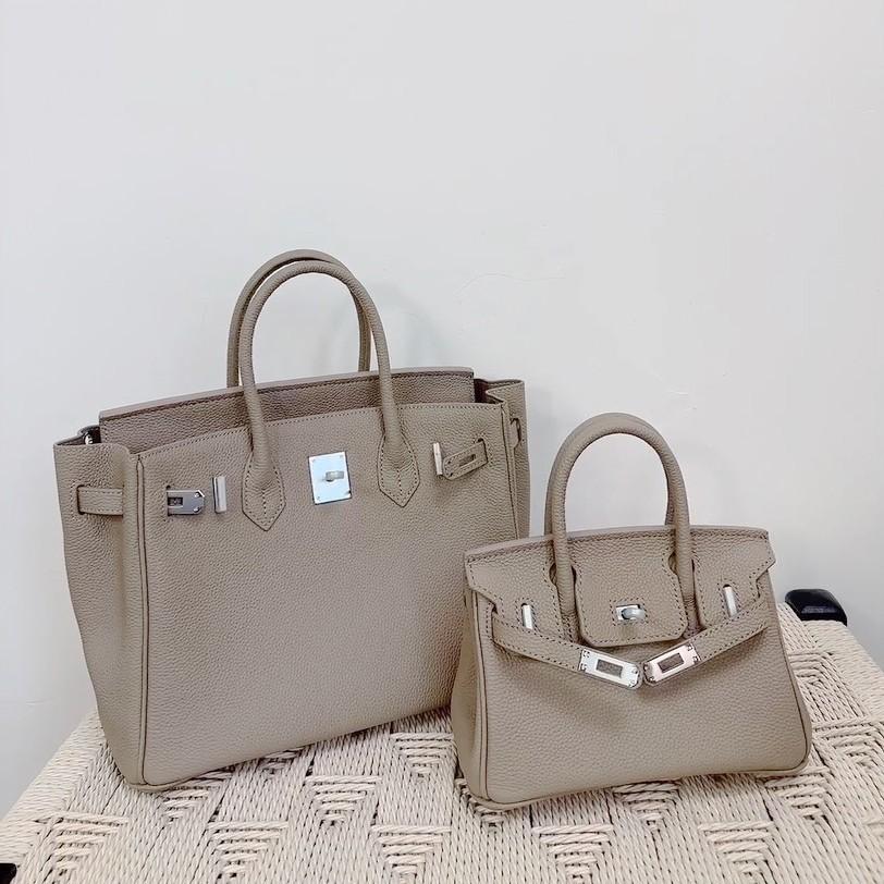 Togo primo strato pelle di mucca borsa platino motivo litchi fibbia argentata borsa a mano serratura di alta gamma borsa a tracolla messenger in pelle da donna