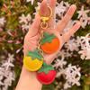 Vibranting PU Tomato Keychain Portable Accessory for Keys Bags Or Car Decoration