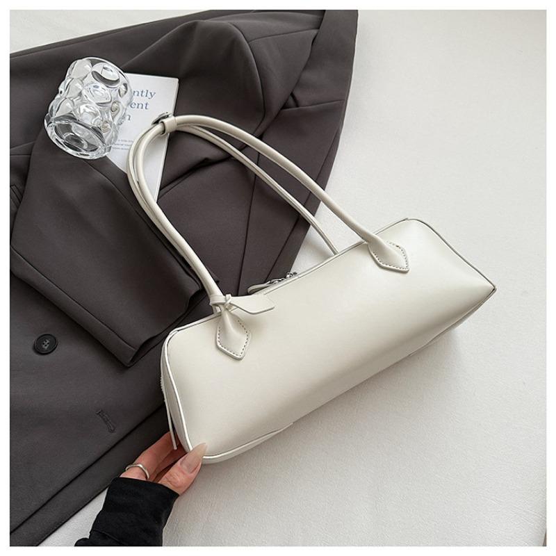 Women s bag 2 new sausage bag long handle baguette bag niche retro underarm bag women s portable shoulder bag
