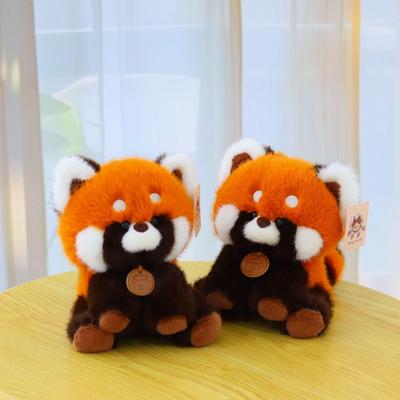 Kreativer Tisch mit sitzender Waschbär-Puppe Plüschtier Roter Panda Stoffpuppe Kinderbegleitpuppe Geburtstagsgeschenk