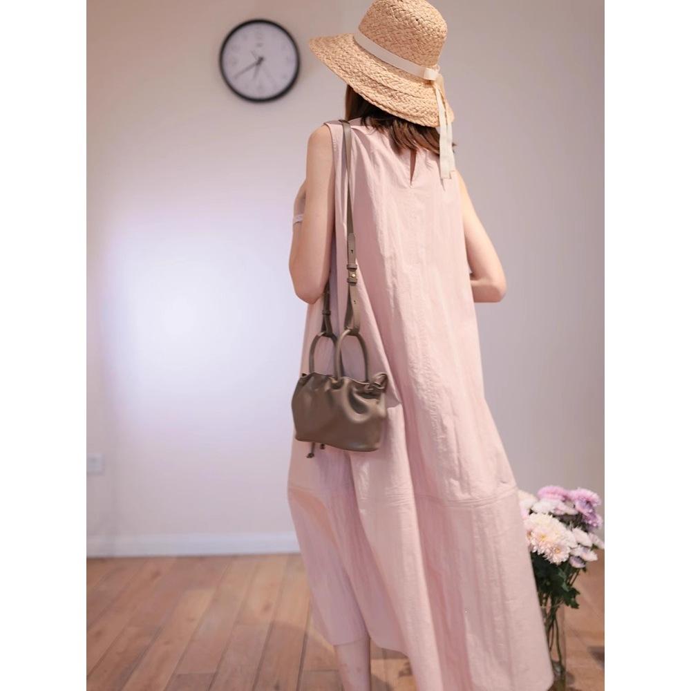 French high-end pink sleeveless vest dress women's summer seaside vacation loose and thin temperament beautiful long dress