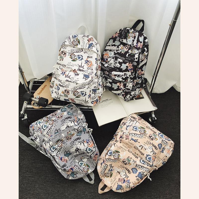 New backpack male junior high school student schoolbag fashionable new female backpack travel backpack