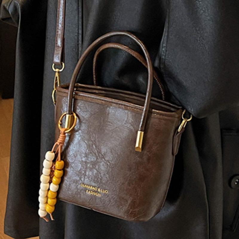 Casual retro small bag women's new fashion messenger bag commuter shoulder high value bucket bag