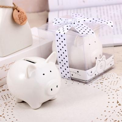 Sparschwein aus Keramik in Form eines weißen Schweins