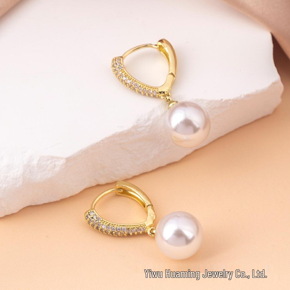 Elegante baumelnde Ohrringe mit französischen Perlen: Vergoldet, Vintage-Design in Silber 925