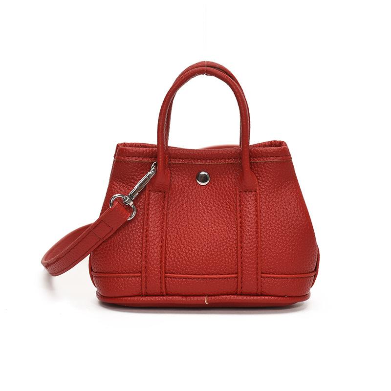 New Product Wholesale Niche Design Simple Mini Handbag Korean Personality Versatile Lychee Pattern Messenger Change Bag Woman