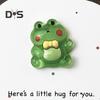Decoração de dinossauro de desenho animado de abraço de bolso com cartão comemorativo Um pequeno abraço, sapo verde, ornamento de resina, amigos, família, aniversário, presente de aniversário