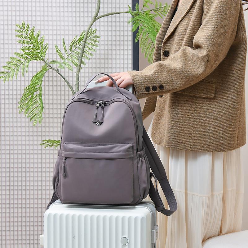 Schoolbag Wholesale Commuter Travel Backpack New Women's Travel Backpack Large Capacity Lightweight Fashion School Bag Niche School Bag