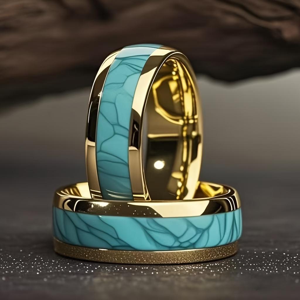 

Унікальне кільце зі сталі золотого кольору з інкрустацією бірюзовим каменем. Обручка для заручин. Весільна прикраса. Кільце з нержавіючої сталі в океанічному стилі. 13