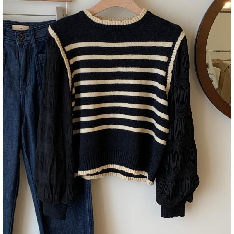 Autumn new black and white striped splicing fake two-piece sweater knitted sweater women's design bubble sleeve top