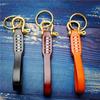Braided Vegetable-Tanned Cowhide Keychain with Brass and Copper Horseshoe Buckle