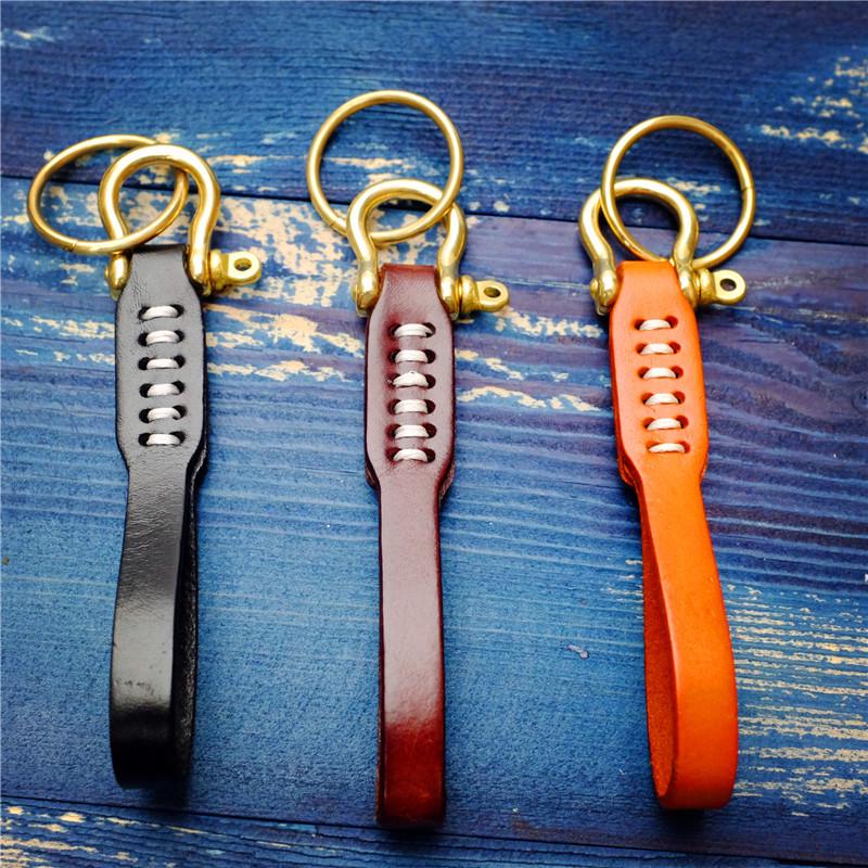Braided Vegetable-Tanned Cowhide Keychain with Brass and Copper Horseshoe Buckle