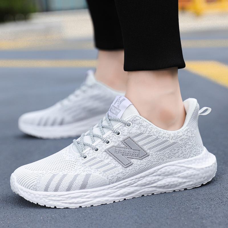 New fly-woven mesh breathable running shoes soft sole lightweight trend versatile sports casual shoes men's fashion couple shoes