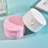 Round Single-Layer Bow Jewelry Storage Box - Solid Color Plastic with Imitation Pattern for Earrings