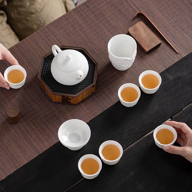 Klassiek Guochao reliëf Dehua suet jade wit porselein geavanceerde Xishi kung fu set theeset huishoudelijke souvenirset