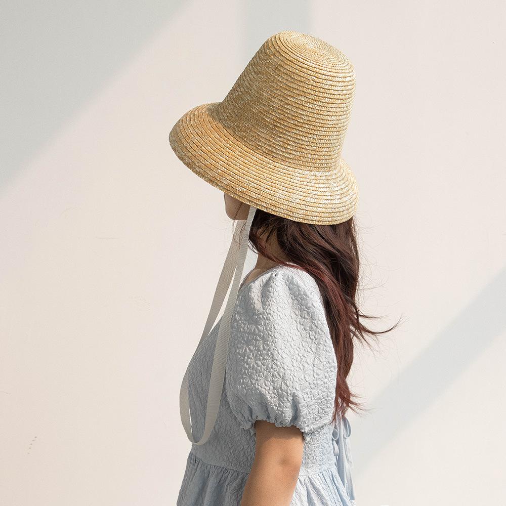 Spring and summer new fashionable retro concave shape with straps High top straw straw straw hat Outdoor sun protection Shade catwalk straw hat
