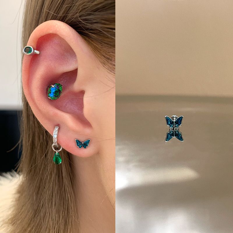 

Магазин Ringring Зеленые титановые серьги-пусеты из медицинской титановой сплава Уникальные серьги-пирсинг для козелка Женские серьги Серьги-пусеты для козелка Dark green glaze butterfly 1