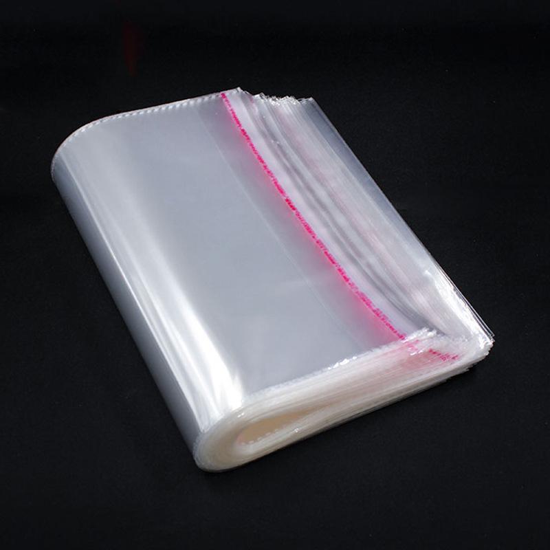 100 Sacchetti Cellophane Trasparenti 23x30 Cm: Autosigillanti Per Imballaggio, Spedizione E Protezione Abbigliamento