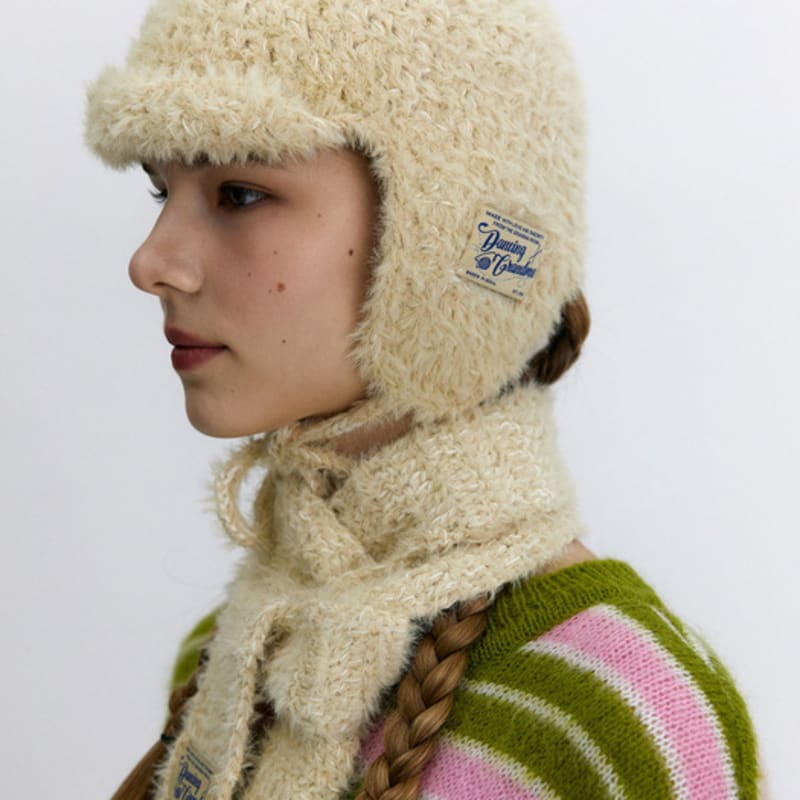 DANSANDE MORMOR ANGORA-TRUPP : VARM ELFENBEN