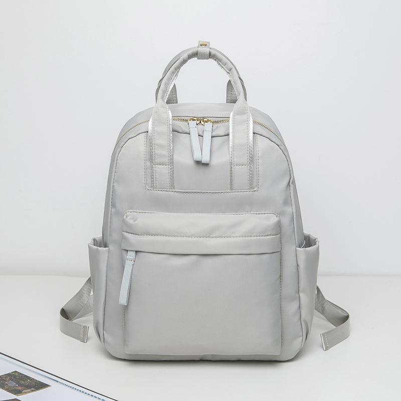 

Сплошной цвет рюкзак Студенческая школьная сумка Оксфордская сумка Женский дорожный рюкзак серый