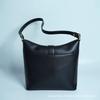 New Leather Shoulder Bag Crossbody Bag Women's Premium Textured Metal Buckle Fashion Commuter Bag Cowhide Lock Bucket Bag