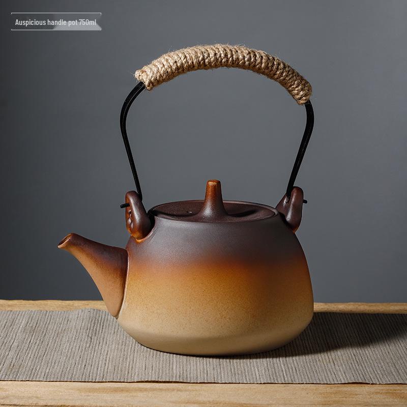 Ceramic Kung Fu Tea Set: Black Teapot with Side Handle and Charcoal Stove for Open Fire.