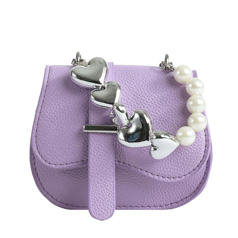 

Korean version mini saddle small bag women s 2024 new spring texture oblique bag fashion chain shoulder bag фіолетовий