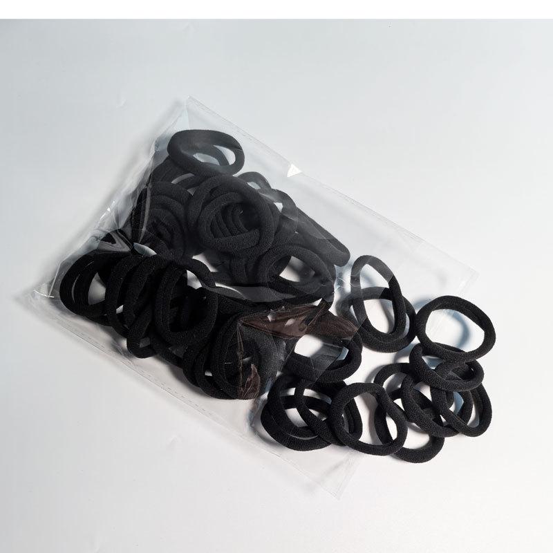 Hochelastische Haargummis in Kaffeefarbe: Dicke, haarschonende Frotteeschlingen