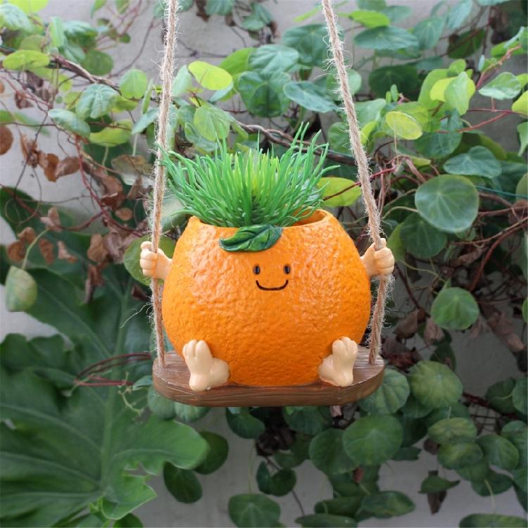 Creative Multifunctional Orange Swing Planter Pot With Swing Feature Suitable for Kids Entertainment and Home Gardening