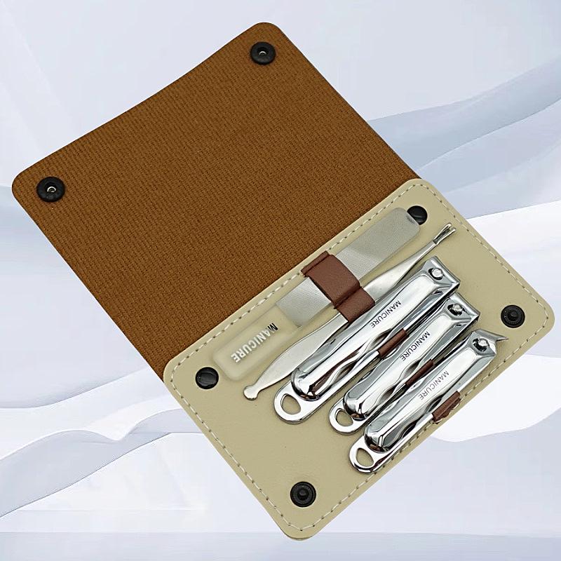 Stainless Steel Manicure Set: Nail Clippers, Cuticle Pusher, Ear Pick, File.