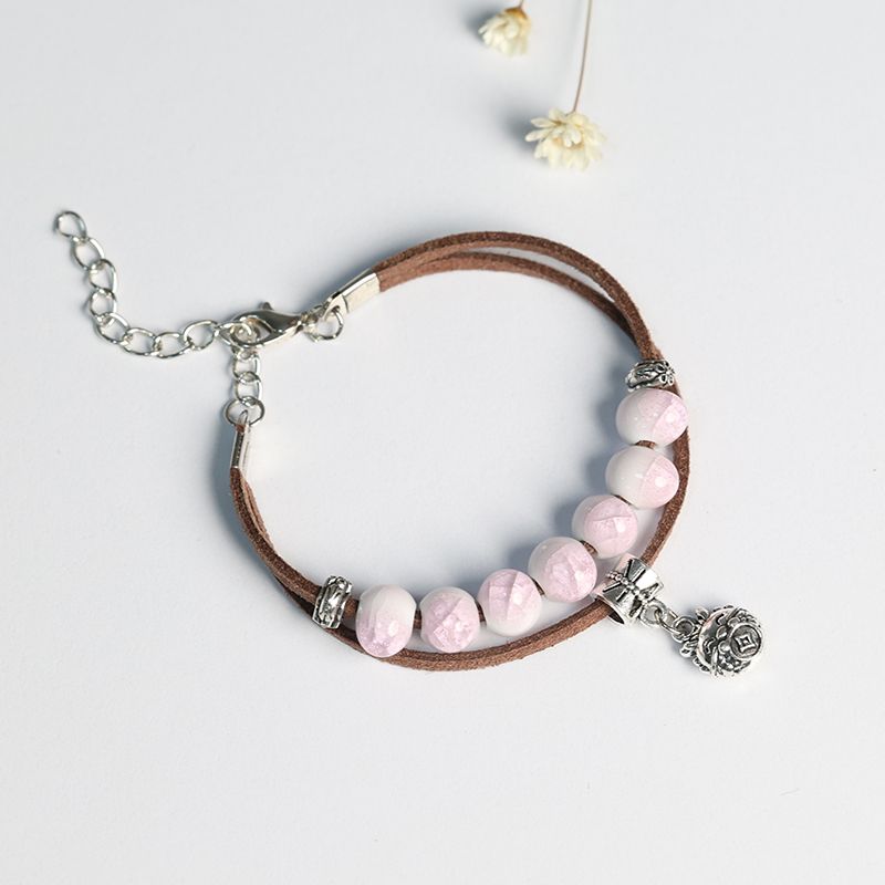 

Свежий браслет из плетеной кожи Мори Женский керамический браслет с кракелюрной глазурью и бусинами Фарфоровые бусины-розочки Ремешок для переноски Аксессуары в ретро-стиле Маленькие украшения Ice Crack Powder [Coin Longbao]]