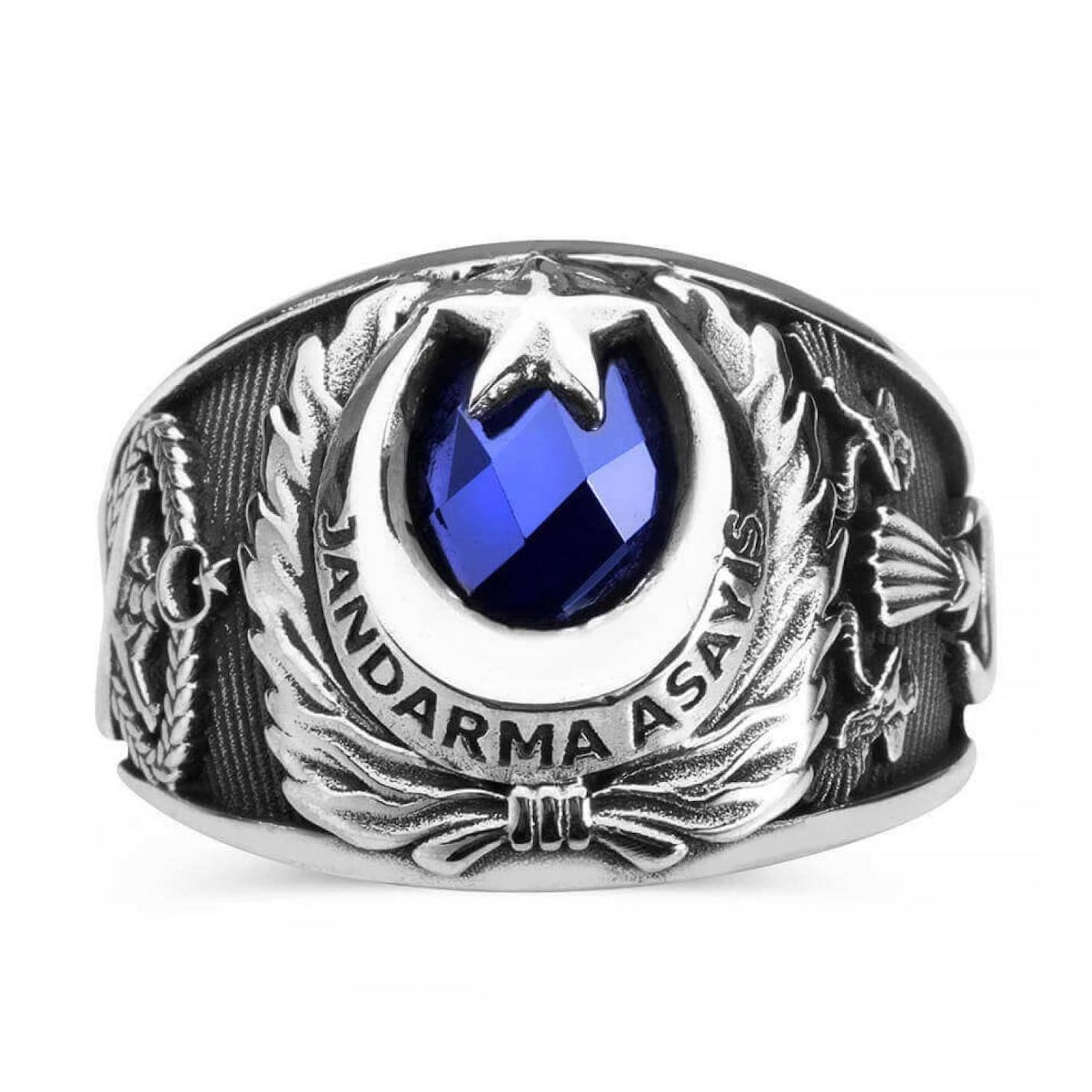 

Кольцо общественного порядка жандармерии в форме полумесяца и звезды