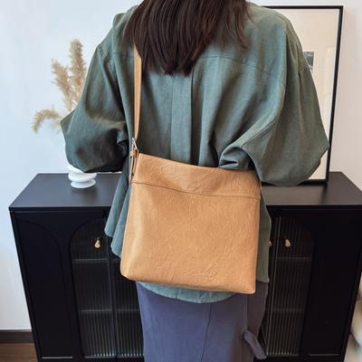 Leichter Luxus High-End Tasche Damen Frühling und Sommer neu retro schlichte Bucket Bag modische Schulter Umhängetasche