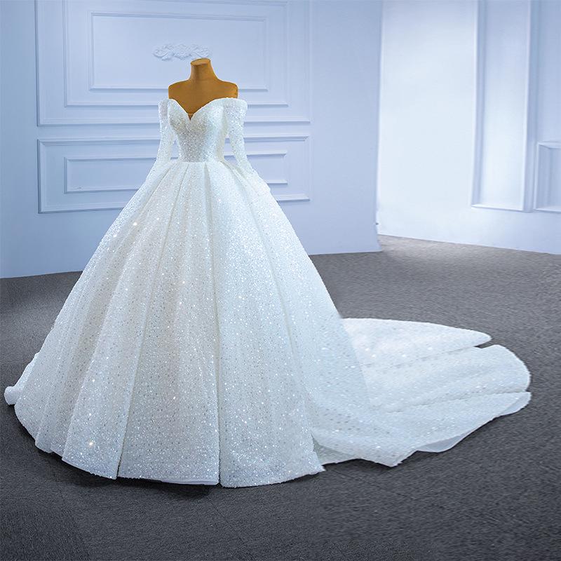 2026 French Wedding Dress: Retro One-Shoulder Long Sleeve with Heavy Beading and Long Train.