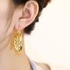 Boucles d'oreilles françaises en cuivre Boucles d'oreilles torsadées dorées pour femmes Design de niche Sens de la mode Boucles d'oreilles légères de luxe pour femmes