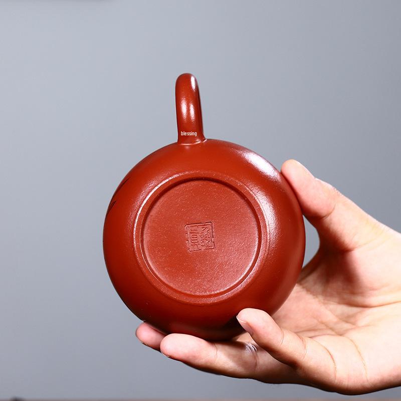 Handmade Yixing Zisha Teapot with Engraved Design - Xin Qing Xi Shi Tea Set