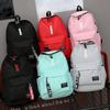 Fashion trend backpack for men and women, high school student bag, large capacity, Korean version of the