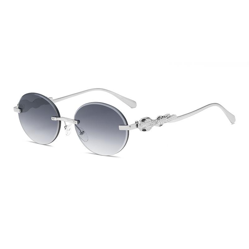 Europe and the United States gradual change frameless sunglasses oval frame fashion street shot anti-ultraviolet sunglasses retro trimmed sunshade gla